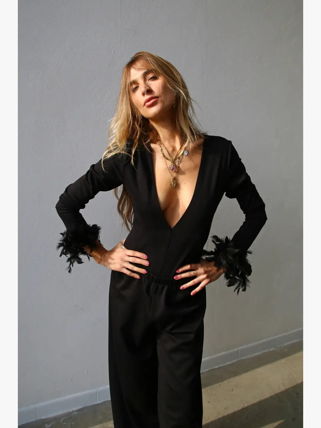 W5190 polsini con piume nero