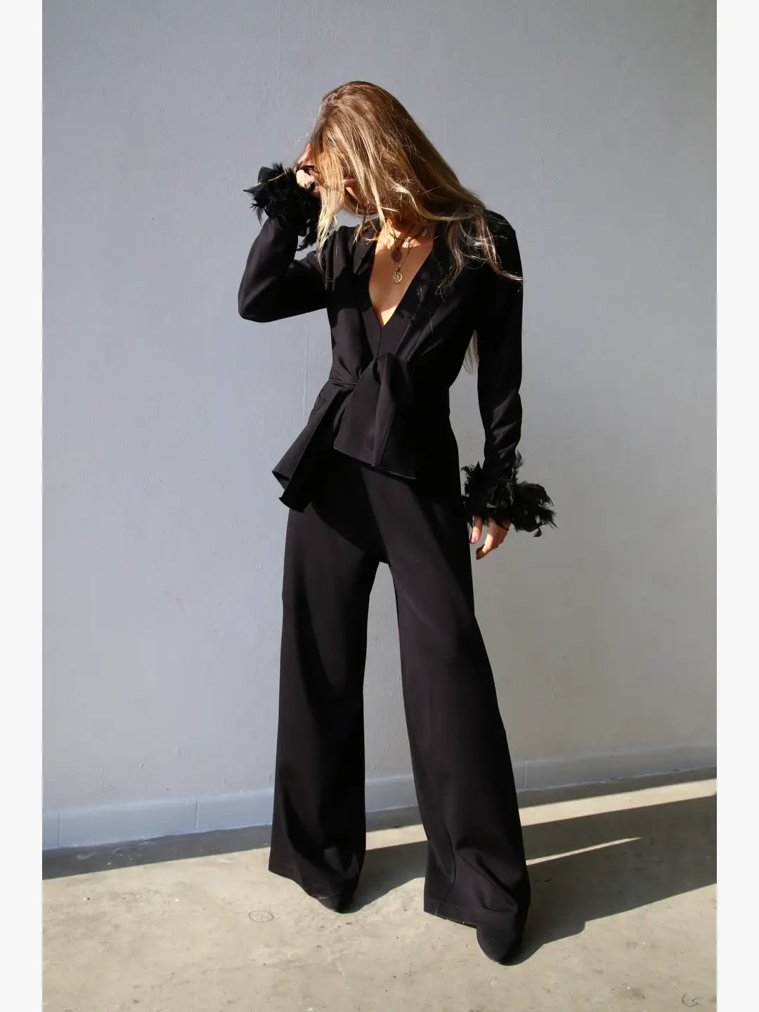 W5190 polsini con piume nero