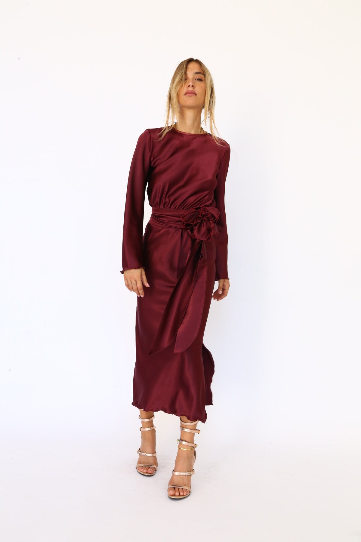 Burgundy satin midi dress with long sleeves and a keyhole back
