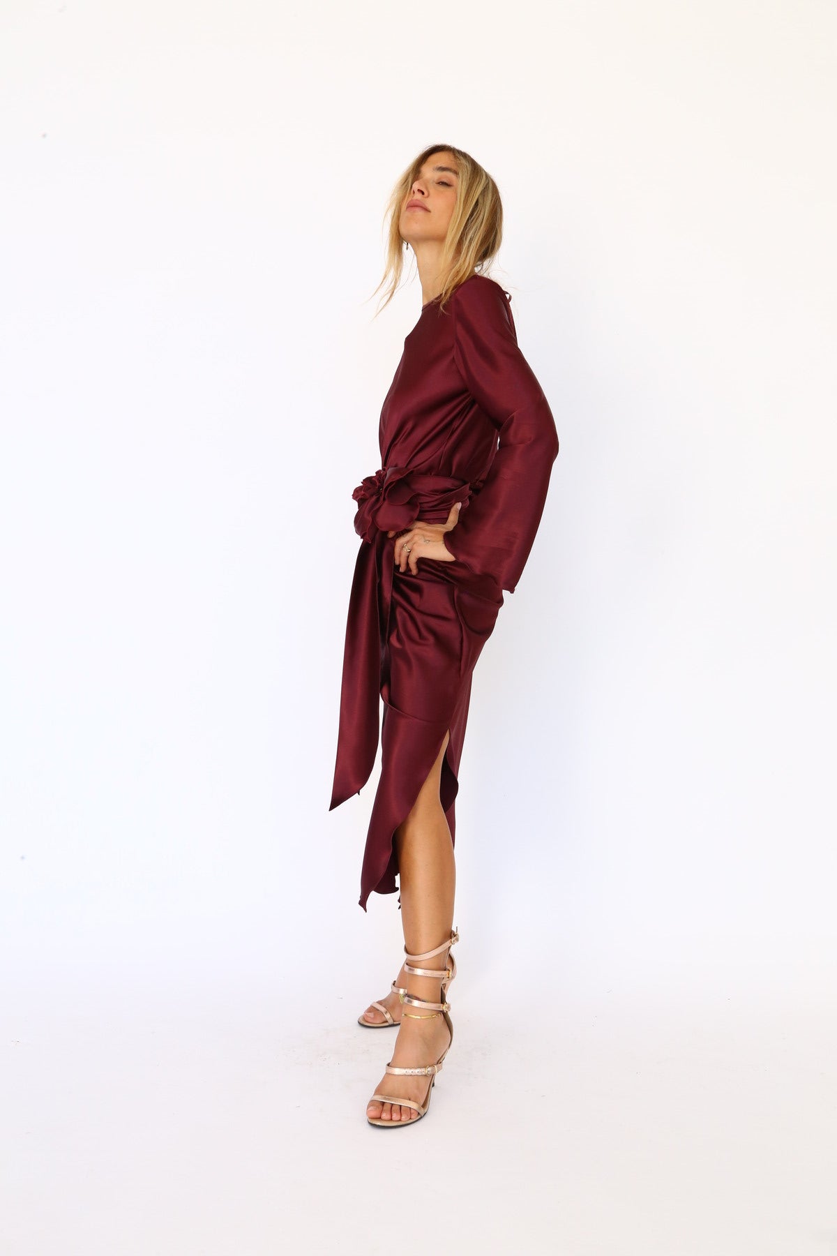 Burgundy satin midi dress with long sleeves and a keyhole back