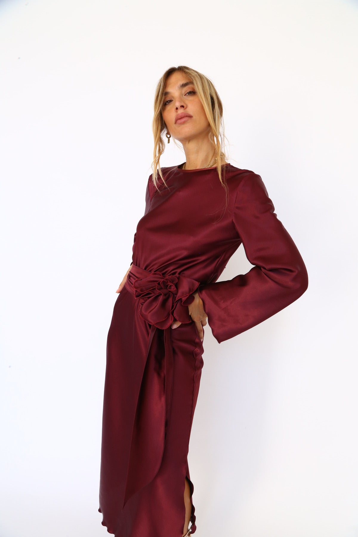 Burgundy satin midi dress with long sleeves and a keyhole back