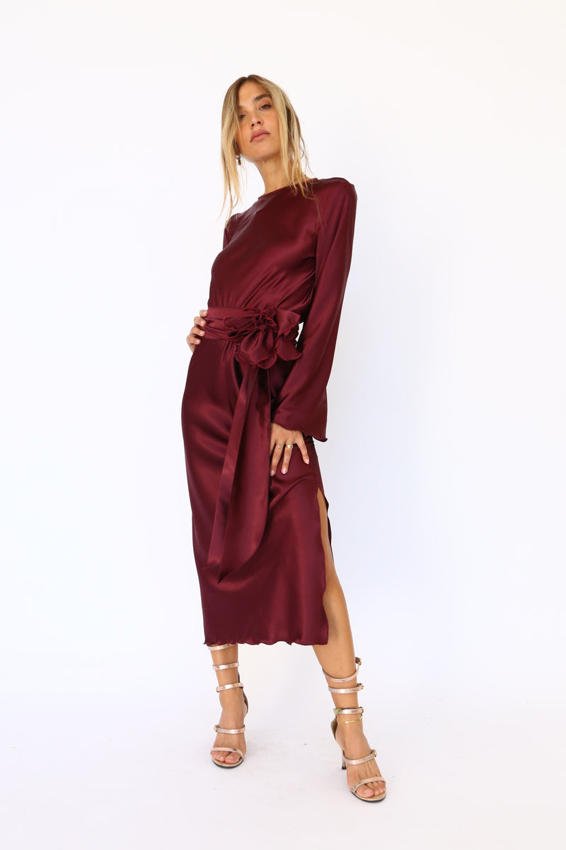 Burgundy satin midi dress with long sleeves and a keyhole back