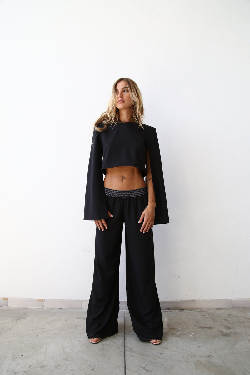 Pantaloni logato scampanato crepe nero